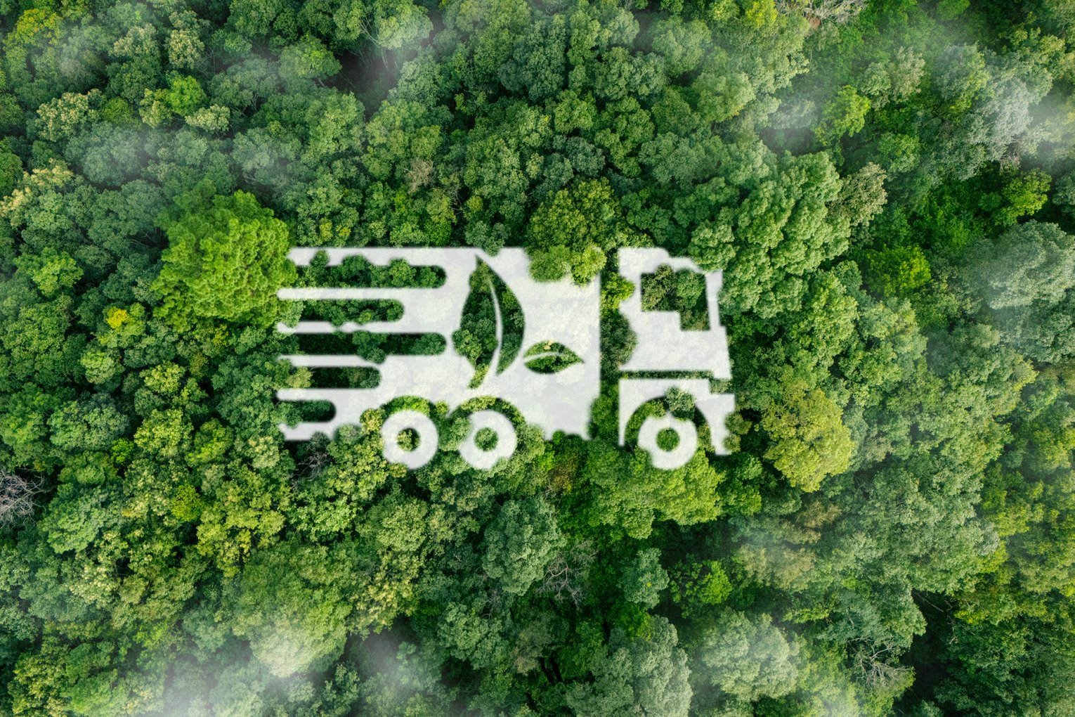 Nachhaltige Logistik Luftaufnahme eines grünen Waldes mit einer in den Bäumen geformten Silhouette eines LKW.